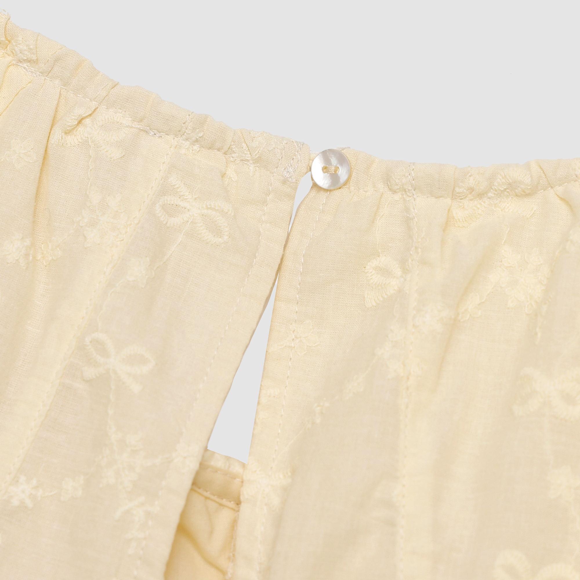 Elara Bow Embroidered Romper