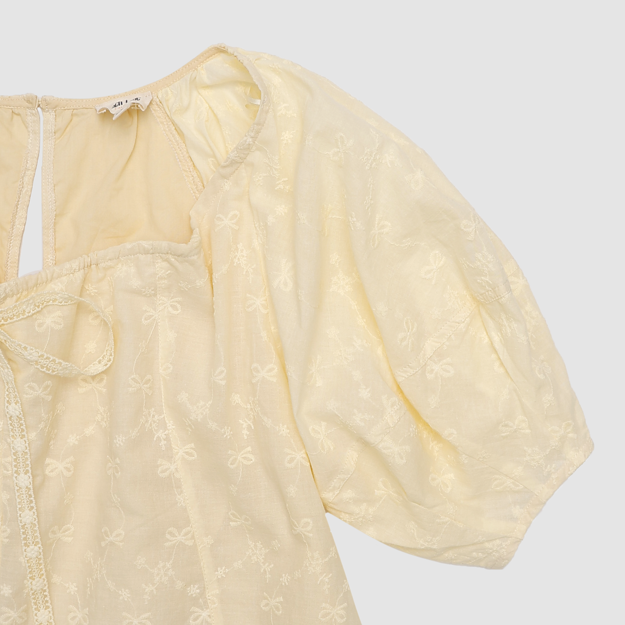 Elara Bow Embroidered Romper