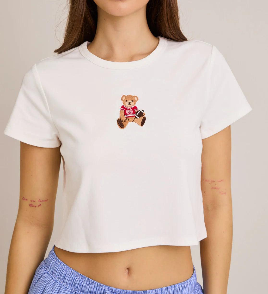 Football Star Teddy Bear Baby Tee in White & Red – Sixteen