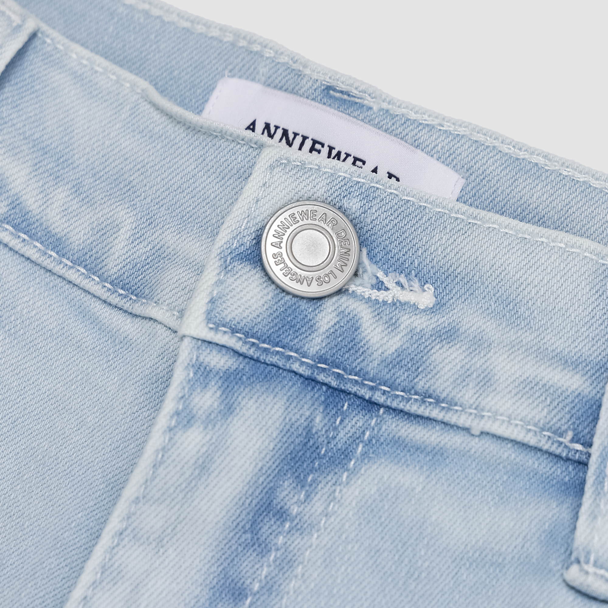 Kaleigh Distressed Hem Denim Shorts in Light Indigo